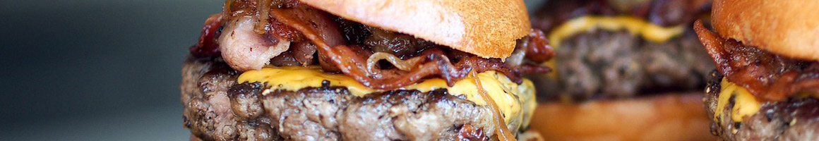 Eating Burger at Scott's Burger Shack restaurant in Sacramento, CA.
